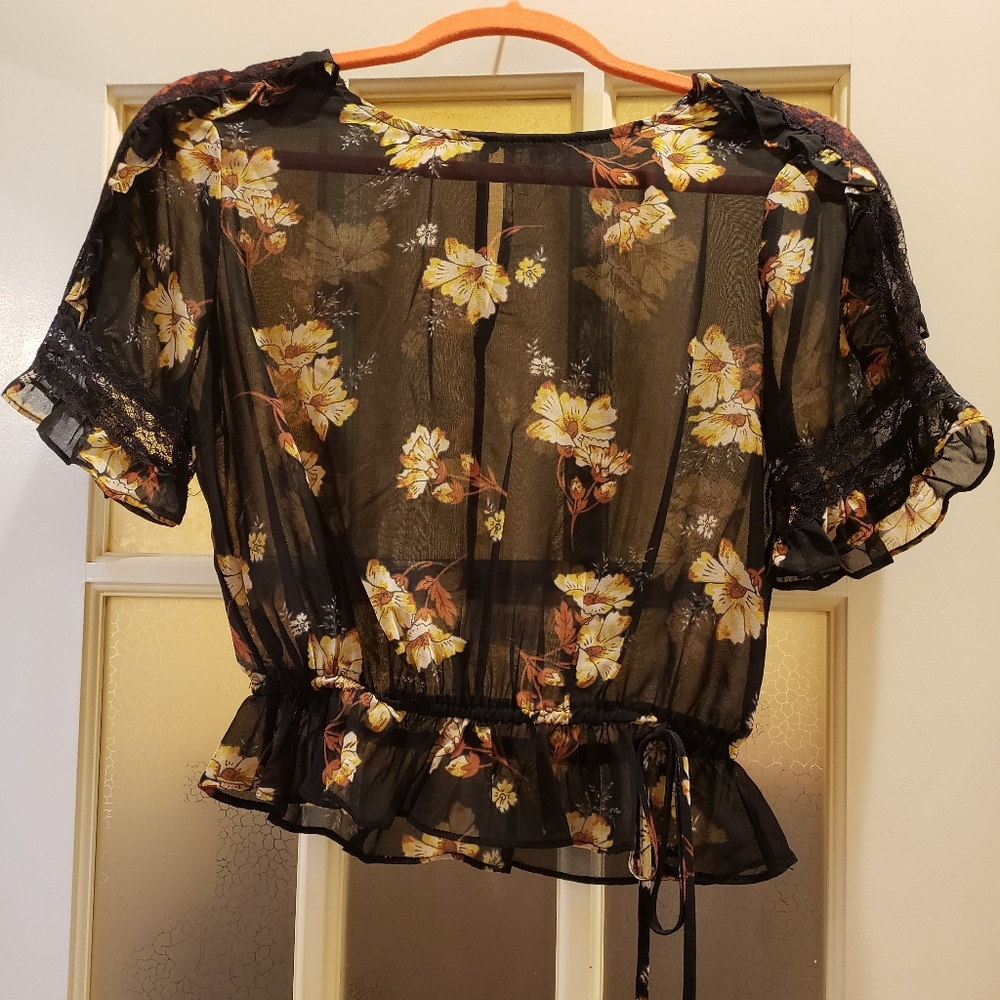 Adorable sheer black top